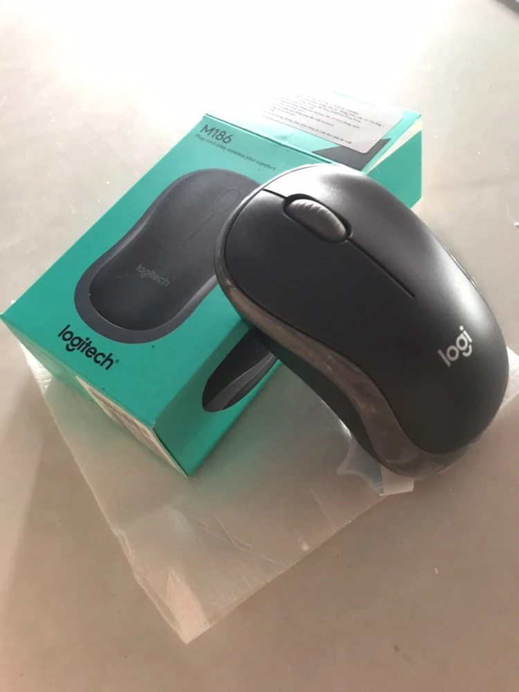 Chuột không dây Logitech M186 - USB, nhỏ gọn, thuận cả 2 tay, phù hợp PC/Laptop